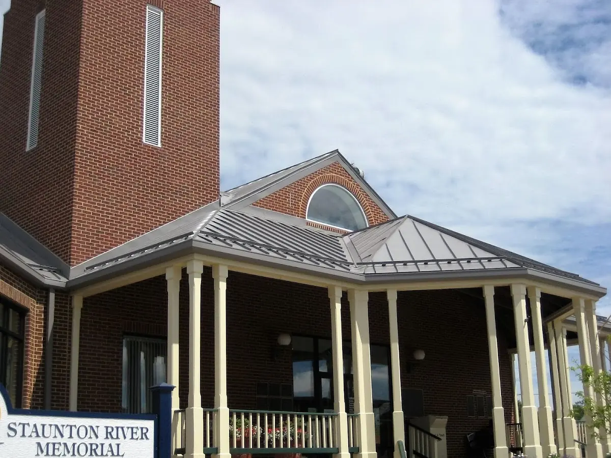 Skilled roofing craftsmen working on a residential roof in Jersey